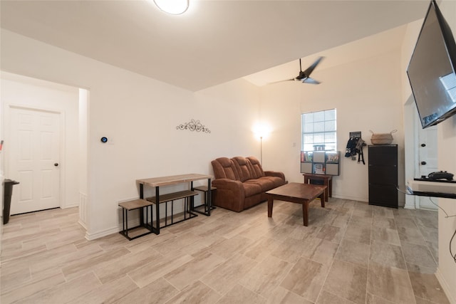 living room featuring ceiling fan