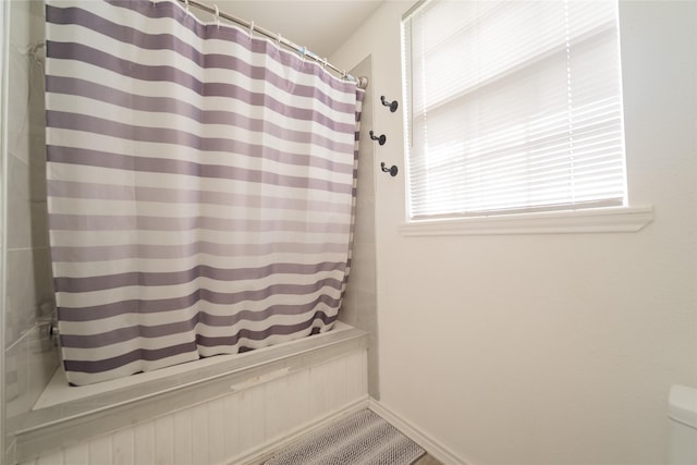 bathroom with a shower with shower curtain