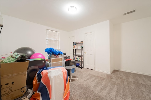 interior space featuring light colored carpet