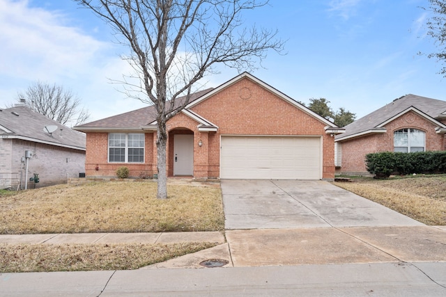 ranch-style home with a garage, brick siding, driveway, and roof with shingles