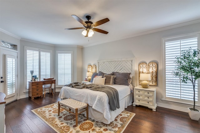 bedroom featuring ornamental molding, dark wood-type flooring, and ceiling fan