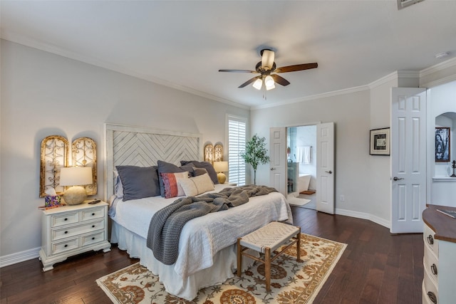 bedroom with crown molding, dark hardwood / wood-style floors, ceiling fan, and ensuite bath