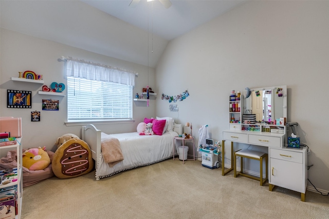 carpeted bedroom with lofted ceiling and ceiling fan