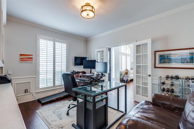 home office with crown molding, dark hardwood / wood-style floors, and french doors