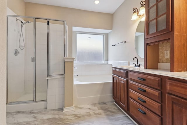 bathroom featuring vanity and plus walk in shower