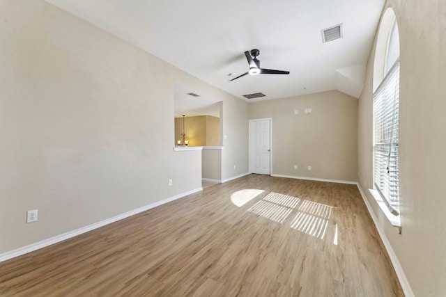 spare room featuring ceiling fan and hardwood / wood-style floors