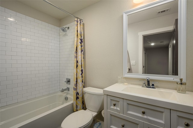 full bathroom featuring vanity, toilet, and shower / bath combo with shower curtain