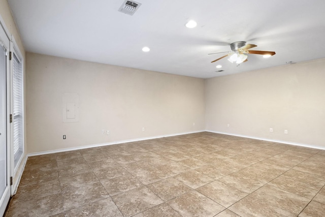 spare room featuring ceiling fan