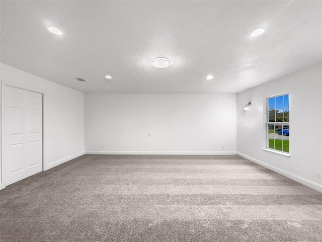 view of carpeted spare room