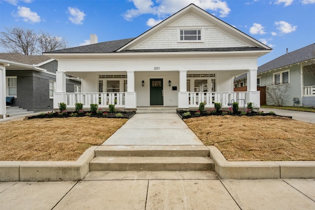 view of front of home featuring covered porch