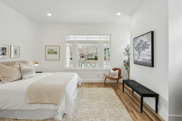 bedroom featuring wood-type flooring