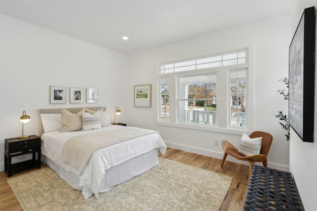 bedroom featuring hardwood / wood-style flooring