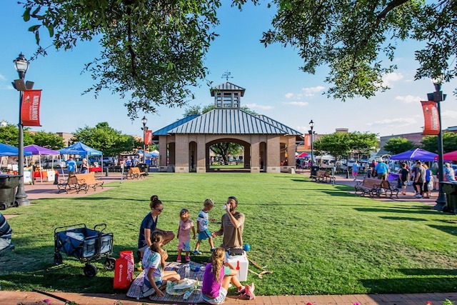 view of community with a gazebo and a yard