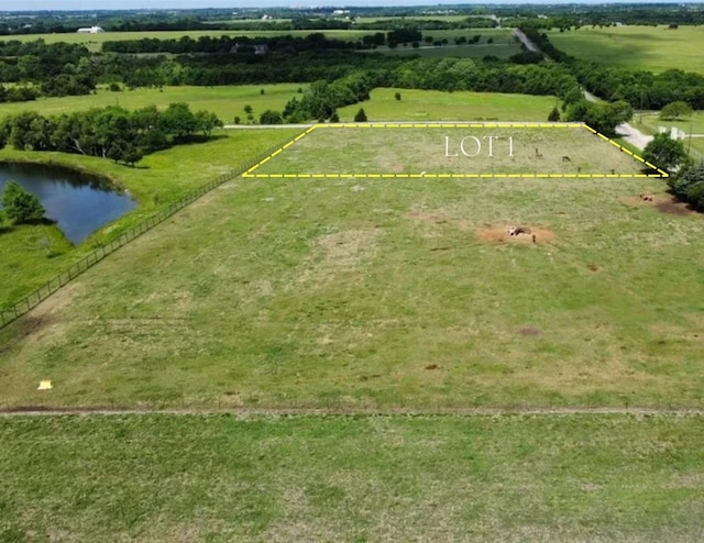 aerial view featuring a water view and a rural view