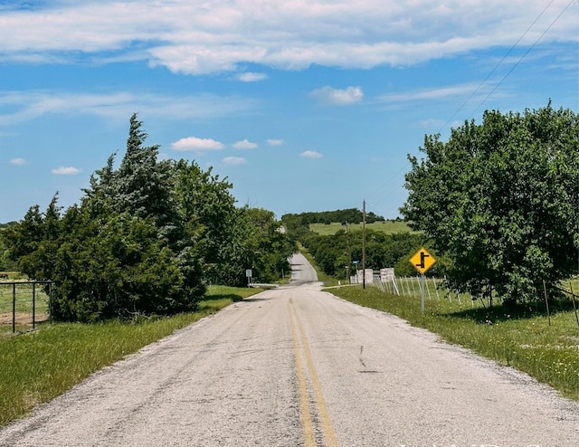 view of road featuring traffic signs