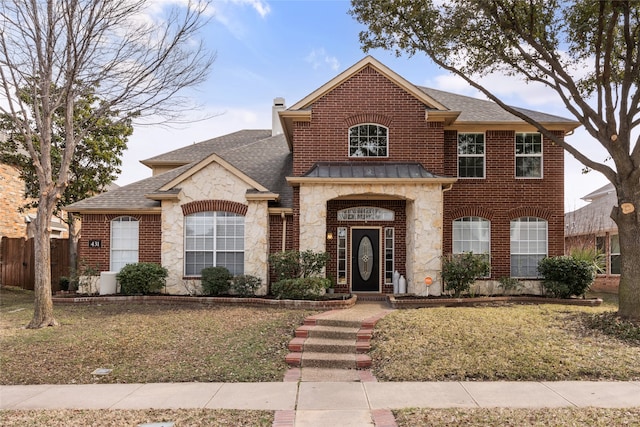 view of front of house with a front lawn