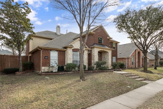 view of front of home with a front lawn