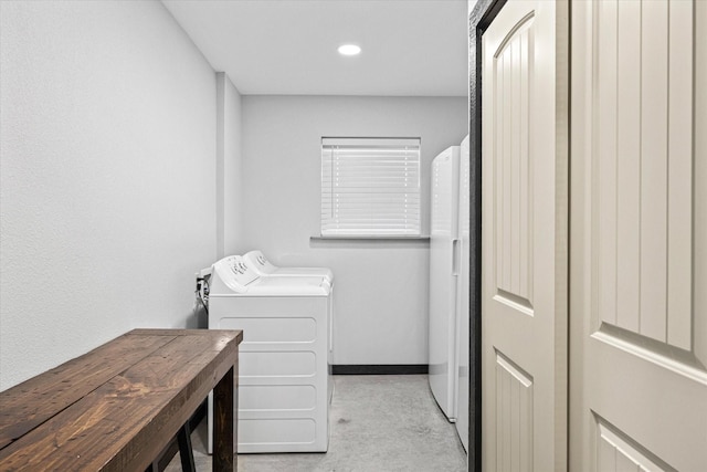 laundry area with separate washer and dryer