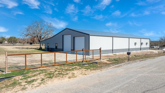 view of outbuilding with a garage