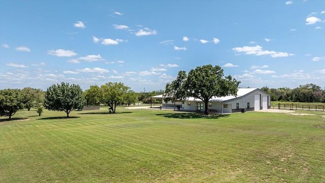 view of yard featuring a garage