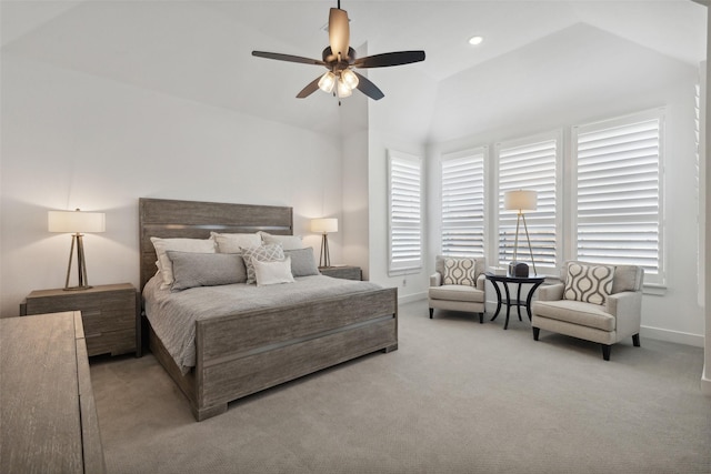 bedroom featuring light colored carpet and ceiling fan