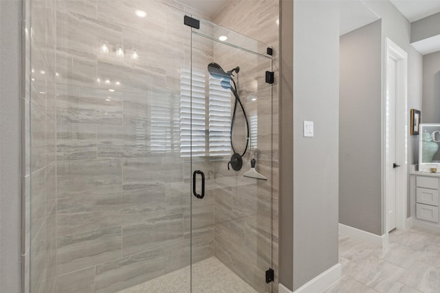 bathroom with an enclosed shower