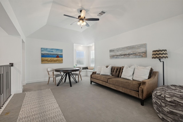 living area with visible vents, a ceiling fan, and carpet flooring