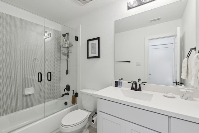 full bath with toilet, combined bath / shower with glass door, visible vents, and vanity