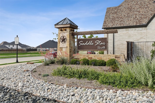 view of community sign