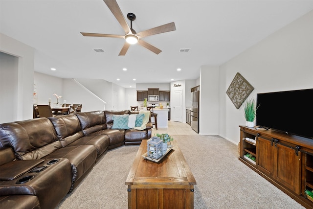 16501 Portage St, Justin, TX 76247 - living area with light colored carpet, a ceiling fan, and recessed lighting