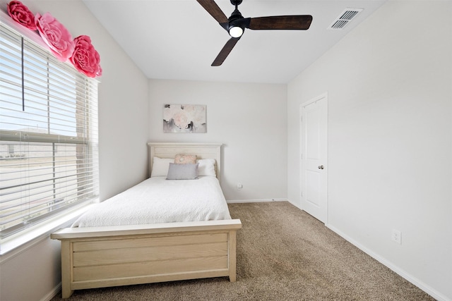 16501 Portage St, Justin, TX 76247 - bedroom with carpet flooring, baseboards, and ceiling fan
