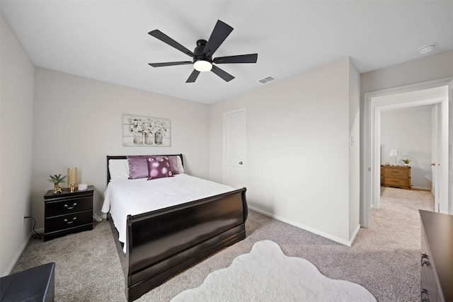 16501 Portage St, Justin, TX 76247 - bedroom featuring light carpet, baseboards, and a ceiling fan