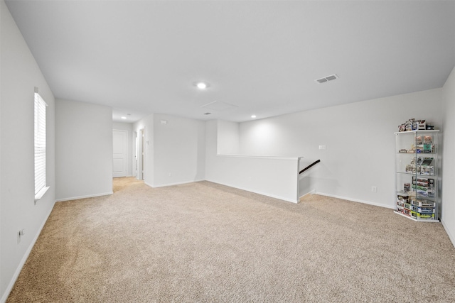 16501 Portage St, Justin, TX 76247 - below grade area featuring light colored carpet, baseboards, and recessed lighting
