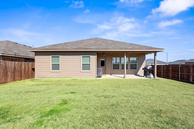 16501 Portage St, Justin, TX 76247 - rear view of property with a patio area and a shingled roof