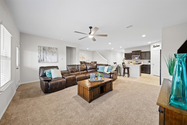 16501 Portage St, Justin, TX 76247 - living area with light carpet, ceiling fan, recessed lighting, and baseboards