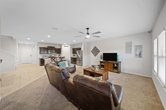 16501 Portage St, Justin, TX 76247 - living area featuring a ceiling fan, light carpet, baseboards, recessed lighting, and light tile patterned floors