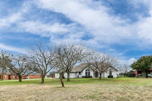 view of front of house with a front yard