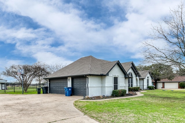 view of home's exterior featuring a yard and a garage