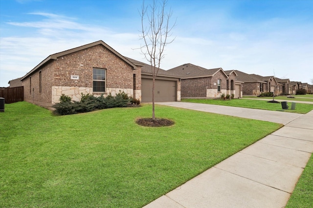 view of front of property with a garage, central air condition unit, and a front lawn