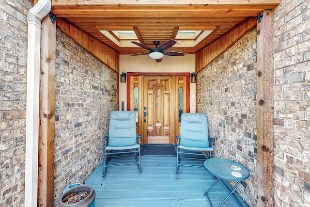 exterior space with ceiling fan