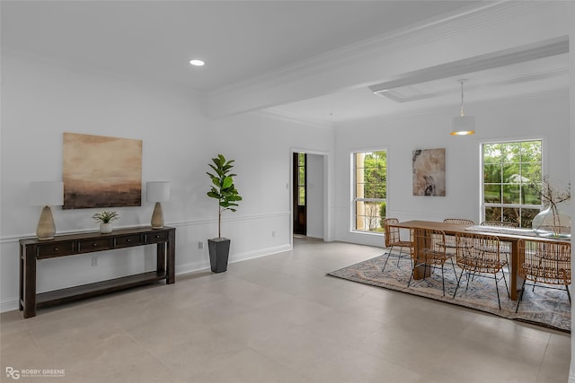 dining room featuring ornamental molding