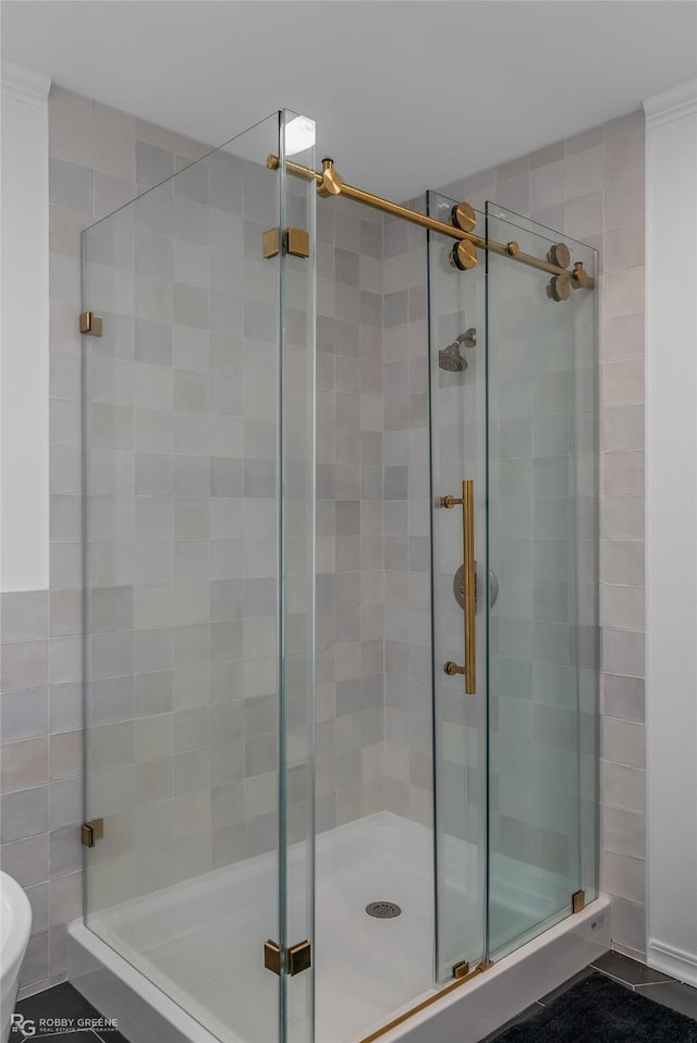 bathroom featuring an enclosed shower