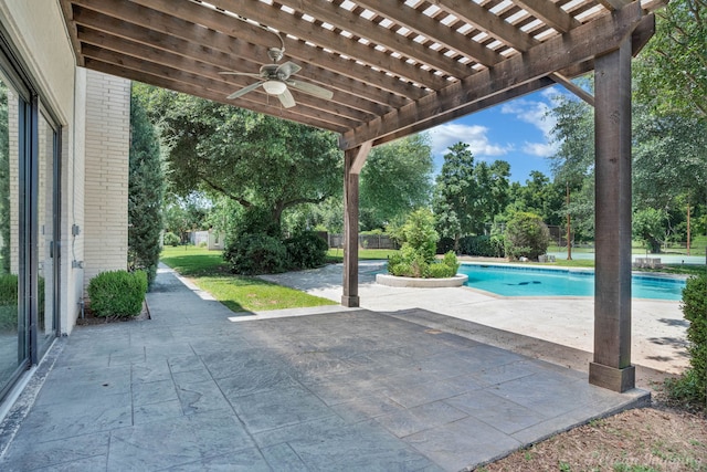 view of patio / terrace with a pergola and ceiling fan