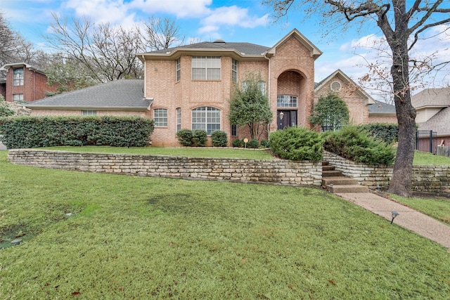 view of front of home with a front yard