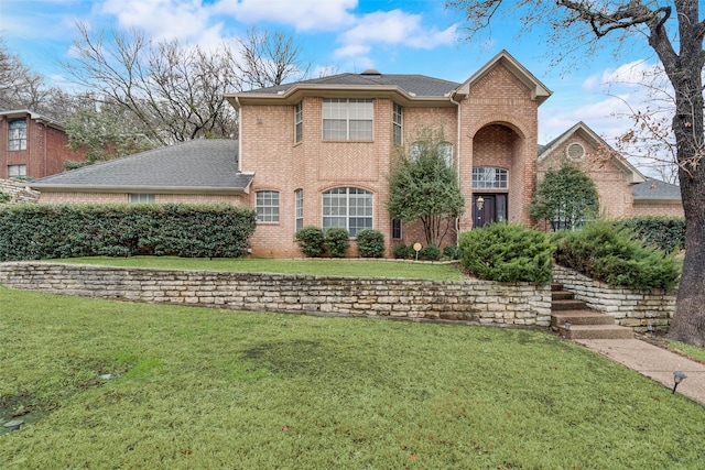 front facade with a front lawn