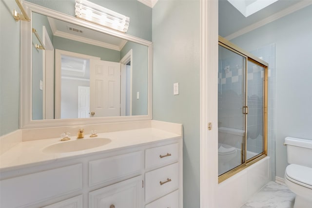 full bathroom with vanity, ornamental molding, enclosed tub / shower combo, and toilet