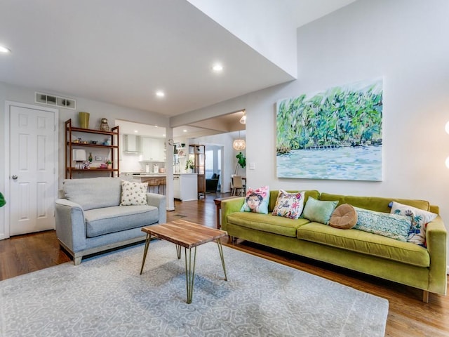 7010 San Mateo Blvd, Dallas, TX 75223 - living area featuring wood finished floors and recessed lighting