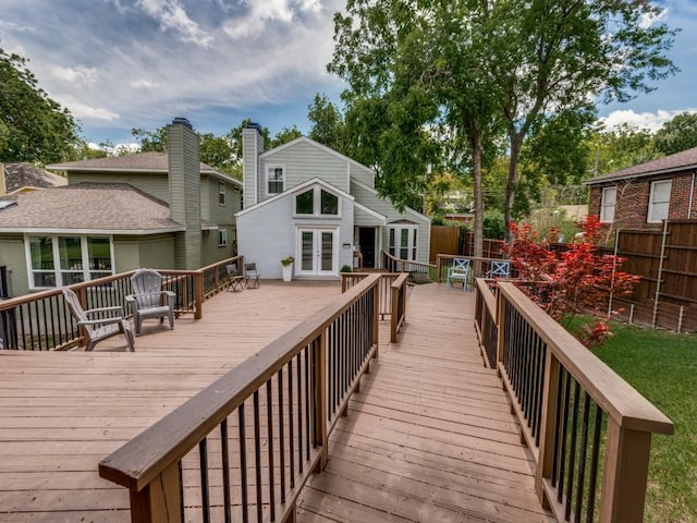 7010 San Mateo Blvd, Dallas, TX 75223 - wooden terrace featuring french doors, fence, and an outbuilding