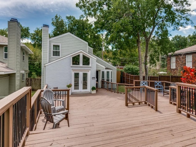7010 San Mateo Blvd, Dallas, TX 75223 - wooden terrace with french doors and a fenced backyard