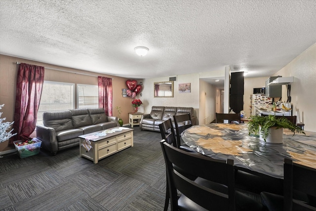 dining area with dark carpet, a textured ceiling, and baseboards